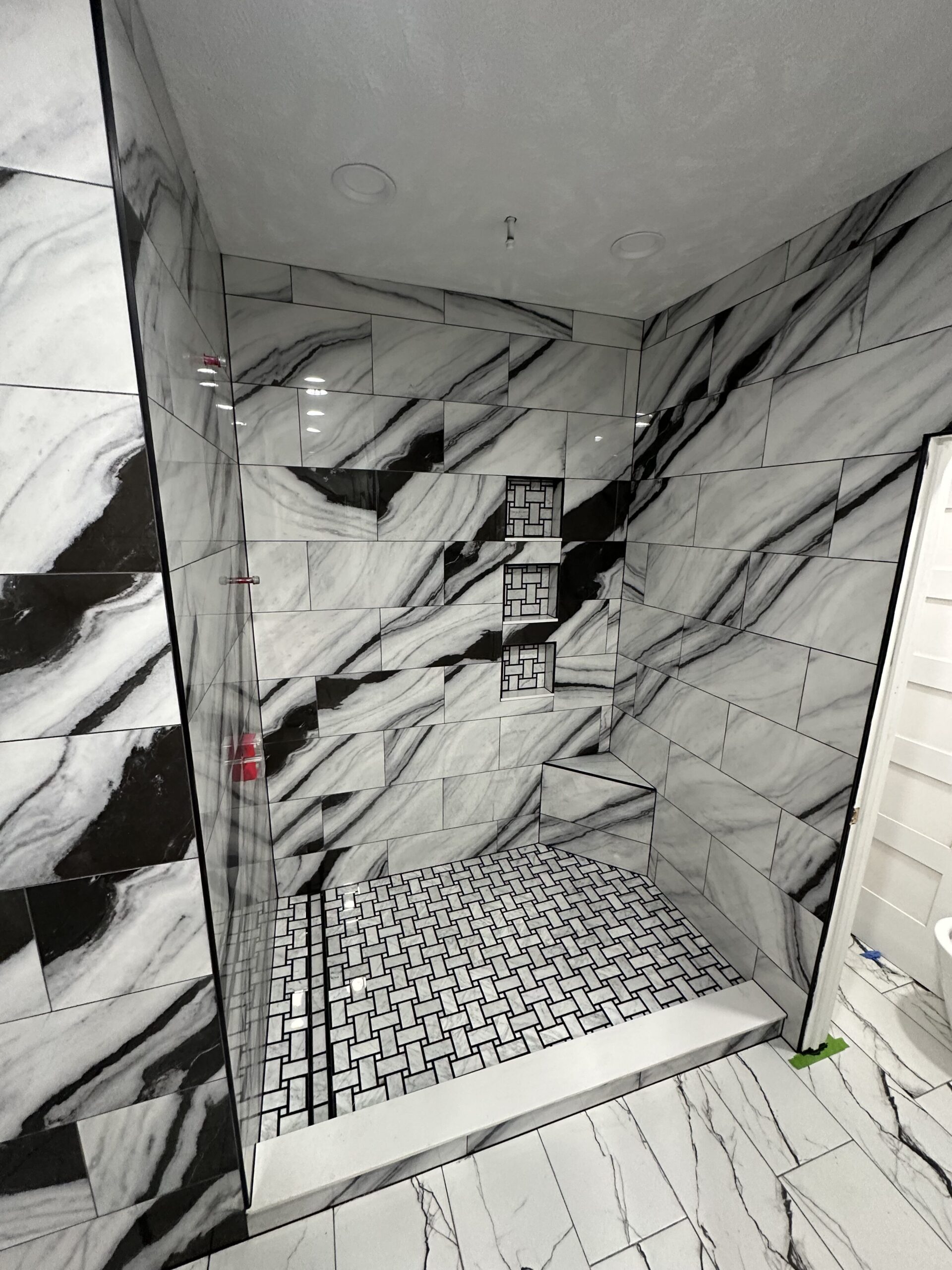 Completed master bathroom remodel in Tysons VA by Dzala General Contractor.